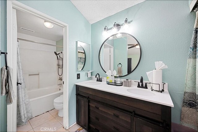 875 S Rexford St, Rialto, CA 92376 - bathroom with toilet, double vanity, shower / bathtub combination with curtain, tile patterned flooring, and a textured ceiling