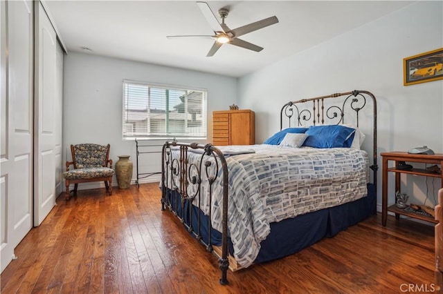 bedroom featuring ceiling fan and wood finished floors