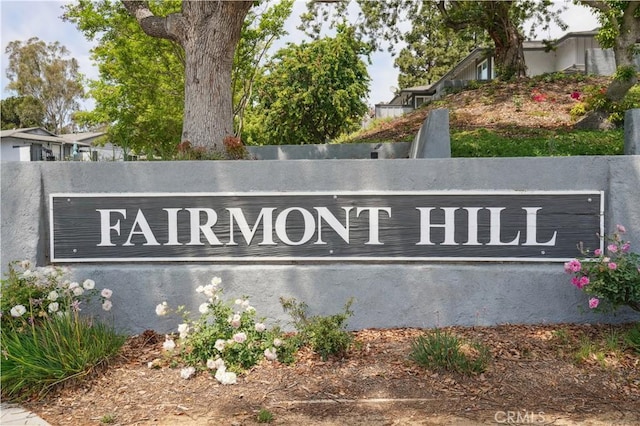 view of community sign