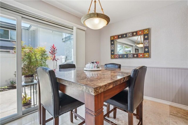 20332 Flower Gate Ln Unit 7, Yorba Linda, CA 92886 - tiled dining area with a wainscoted wall