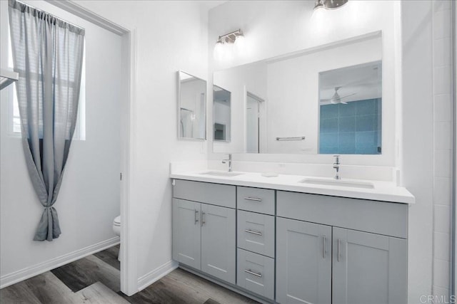 1524 Redbud Way, Oceanside, CA 92056 - full bath with a sink, double vanity, toilet, and wood finished floors