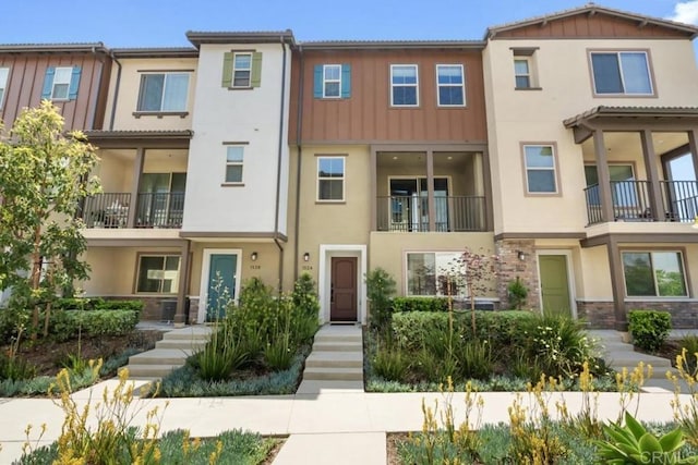 1524 Redbud Way, Oceanside, CA 92056 - view of property featuring stone siding and stucco siding