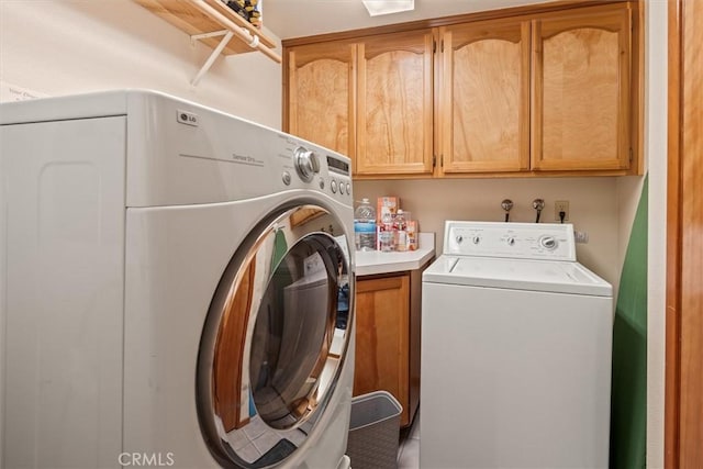 36556 Mudge Ranch Rd, Coarsegold, CA 93614 - laundry room featuring cabinet space and separate washer and dryer