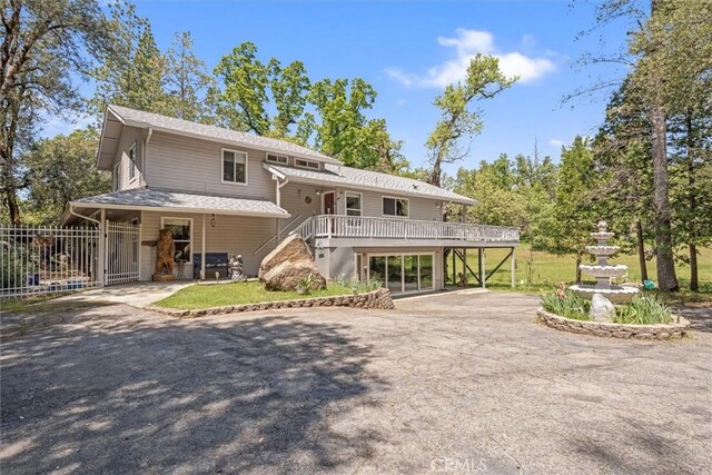 36556 Mudge Ranch Rd, Coarsegold, CA 93614 - view of front of house with stairs, fence, and driveway