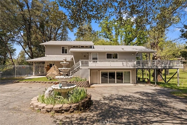 36556 Mudge Ranch Rd, Coarsegold, CA 93614 - rear view of house featuring stairway, a deck, fence, and aphalt driveway