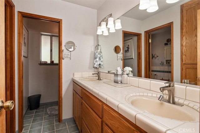 36556 Mudge Ranch Rd, Coarsegold, CA 93614 - bathroom featuring a sink, tile patterned flooring, and double vanity
