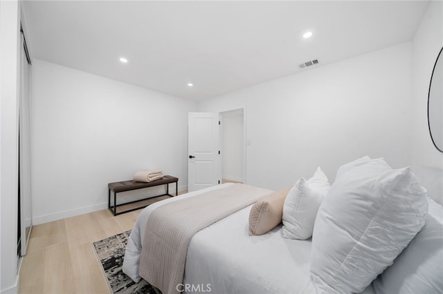 6316 Michelson St, Lakewood, CA 90713 - bedroom featuring baseboards, recessed lighting, light wood-style flooring, and visible vents