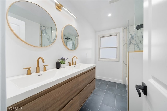 6316 Michelson St, Lakewood, CA 90713 - bathroom with double vanity, a sink, baseboards, and tile patterned floors