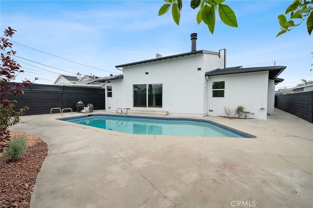 6316 Michelson St, Lakewood, CA 90713 - view of swimming pool with a patio, a fenced backyard, and a fenced in pool