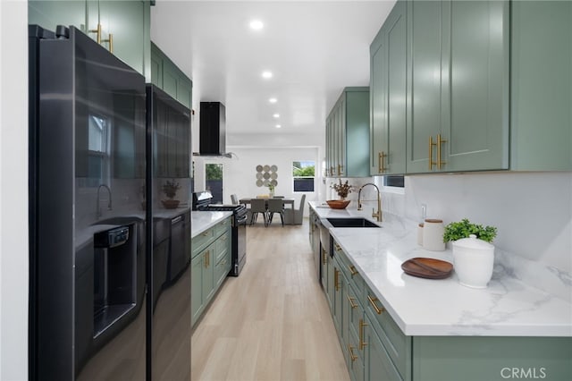 6316 Michelson St, Lakewood, CA 90713 - kitchen with a sink, green cabinets, and black appliances