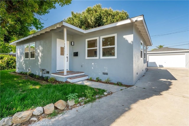 16737 E Greenhaven St, Covina, CA 91722 - view of front of property with crawl space, an outbuilding, stucco siding, and a garage