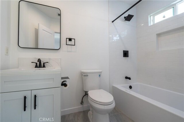 16737 E Greenhaven St, Covina, CA 91722 - bathroom featuring toilet, vanity, shower / bathtub combination, and baseboards