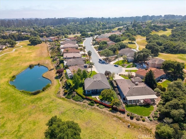 bird's eye view featuring a residential view and a water view