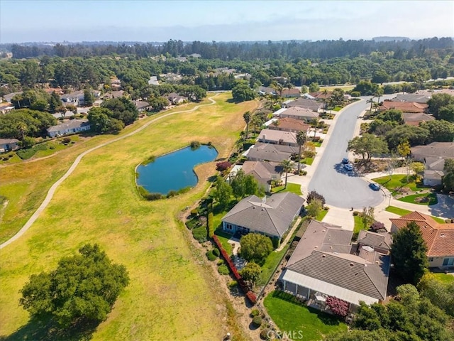 bird's eye view featuring a water view and a residential view