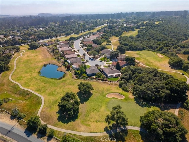 aerial view with a water view, golf course view, and a residential view