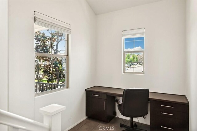 tiled office space with baseboards