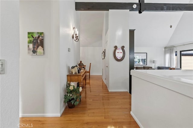 672 Serrano Dr Unit 9, San Luis Obispo, CA 93405 - hallway featuring vaulted ceiling, light wood-style floors, and baseboards