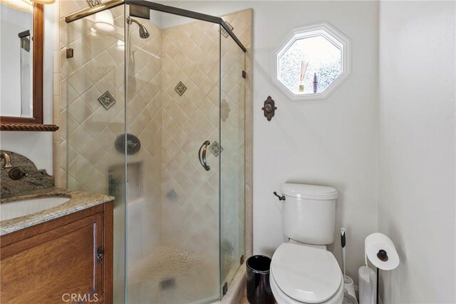 672 Serrano Dr Unit 9, San Luis Obispo, CA 93405 - bathroom with a stall shower, vanity, and toilet