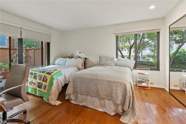 672 Serrano Dr Unit 9, San Luis Obispo, CA 93405 - bedroom with wood finished floors, baseboards, and recessed lighting