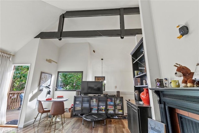 672 Serrano Dr Unit 9, San Luis Obispo, CA 93405 - home office with wood finished floors, a fireplace, high vaulted ceiling, and beam ceiling