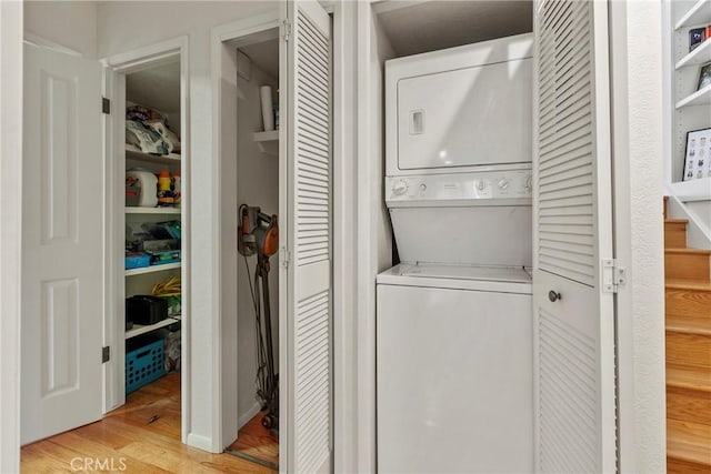 672 Serrano Dr Unit 9, San Luis Obispo, CA 93405 - laundry area with stacked washer / drying machine and light wood-style floors