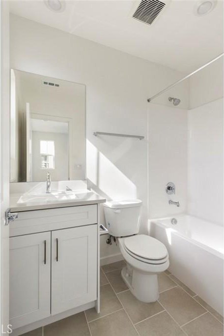 bathroom with vanity, shower / bathtub combination, toilet, tile patterned floors, and visible vents