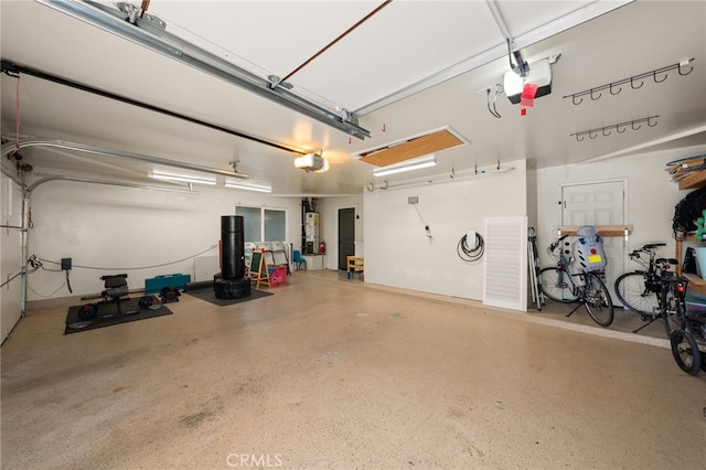 324 W S Ave, Redlands, CA 92373 - garage with a garage door opener and water heater
