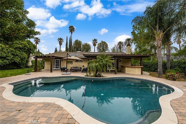 324 W S Ave, Redlands, CA 92373 - swimming pool featuring french doors, a patio area, outdoor lounge area, ceiling fan, and a pergola