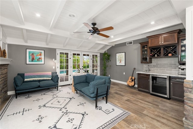 324 W S Ave, Redlands, CA 92373 - living room featuring wine cooler, french doors, light wood-style floors, wet bar, and ceiling fan