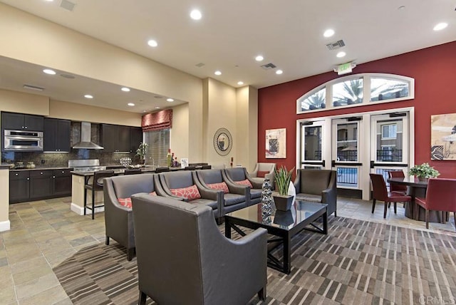 10832 Scripps Ranch Blvd Unit 307, San Diego, CA 92131 - living area featuring recessed lighting, a high ceiling, and visible vents