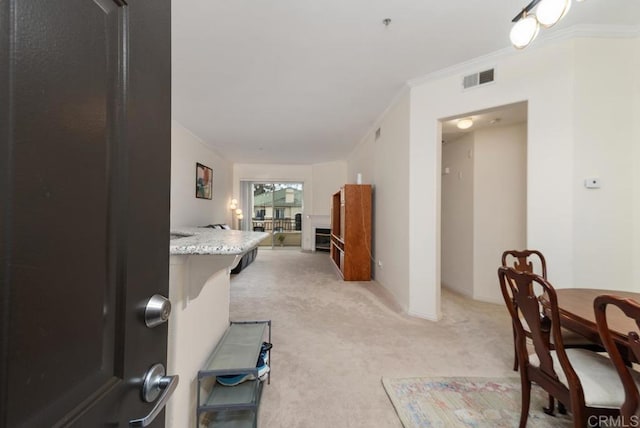 10832 Scripps Ranch Blvd Unit 307, San Diego, CA 92131 - corridor featuring ornamental molding, light colored carpet, and visible vents