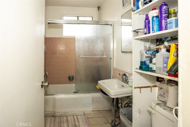 7347 Bakman Ave, Sun Valley, CA 91352 - full bathroom with a sink, enclosed tub / shower combo, tile patterned floors, and toilet