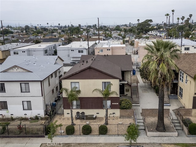 7347 Bakman Ave, Sun Valley, CA 91352 - view of building exterior with a fenced backyard, stairway, and a residential view