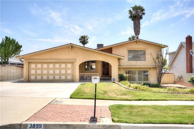 3899 28th St, Highland, CA 92346 - view of front facade with stucco siding, a garage, concrete driveway, a porch, and central air condition unit