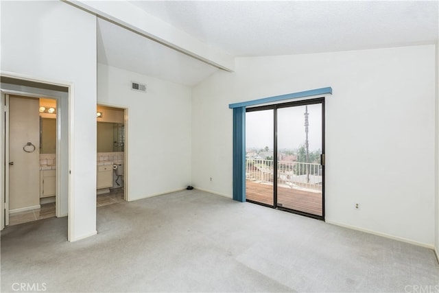 3899 28th St, Highland, CA 92346 - unfurnished bedroom with access to exterior, carpet flooring, baseboards, and ensuite bathroom