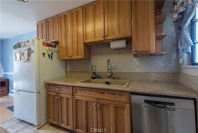 538 Milky Way, Vandenberg Village, CA 93436 - kitchen featuring a sink, freestanding refrigerator, open shelves, decorative backsplash, and stainless steel dishwasher
