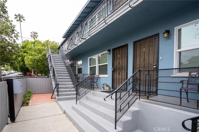 4325 Clinton St, Los Angeles, CA 90004 - view of exterior entry with fence and stucco siding