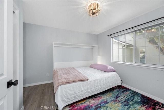 317 Alder St, Arroyo Grande, CA 93420 - bedroom with baseboards and wood finished floors
