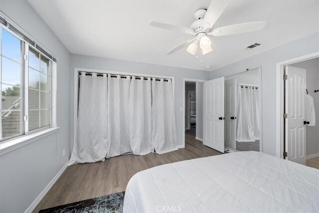317 Alder St, Arroyo Grande, CA 93420 - bedroom featuring baseboards, ceiling fan, wood finished floors, and visible vents