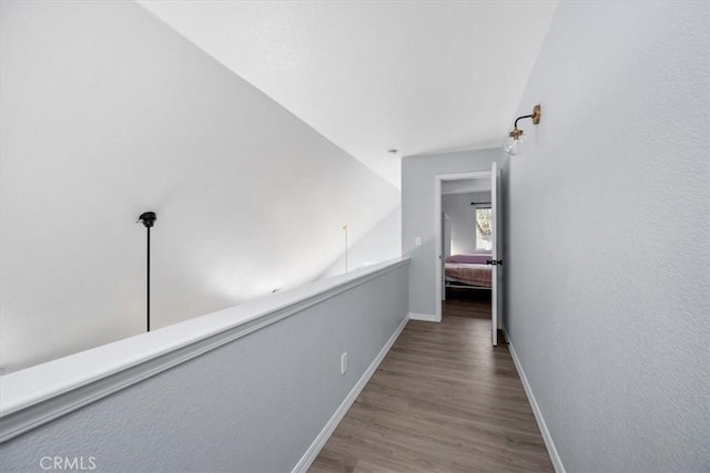 317 Alder St, Arroyo Grande, CA 93420 - hall with baseboards, wood finished floors, and lofted ceiling