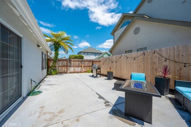317 Alder St, Arroyo Grande, CA 93420 - view of patio with a fenced backyard and a fire pit