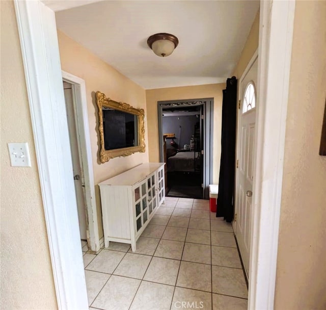 14136 Osage Rd, Apple Valley, CA 92307 - corridor with light tile patterned flooring