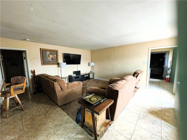 14136 Osage Rd, Apple Valley, CA 92307 - living area with light tile patterned flooring