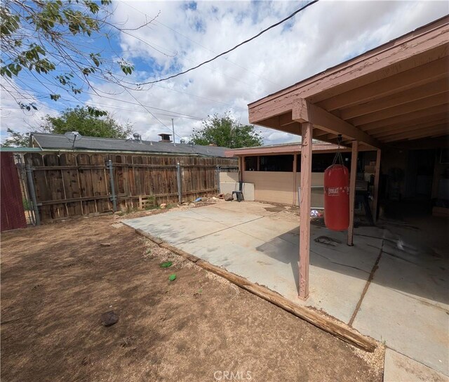 14136 Osage Rd, Apple Valley, CA 92307 - view of patio / terrace with fence