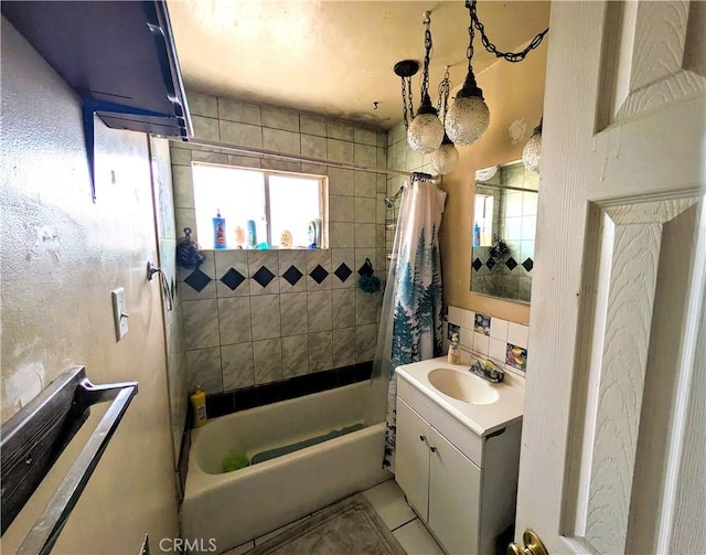 14136 Osage Rd, Apple Valley, CA 92307 - full bath with shower / bath combo with shower curtain, decorative backsplash, tile patterned flooring, and vanity