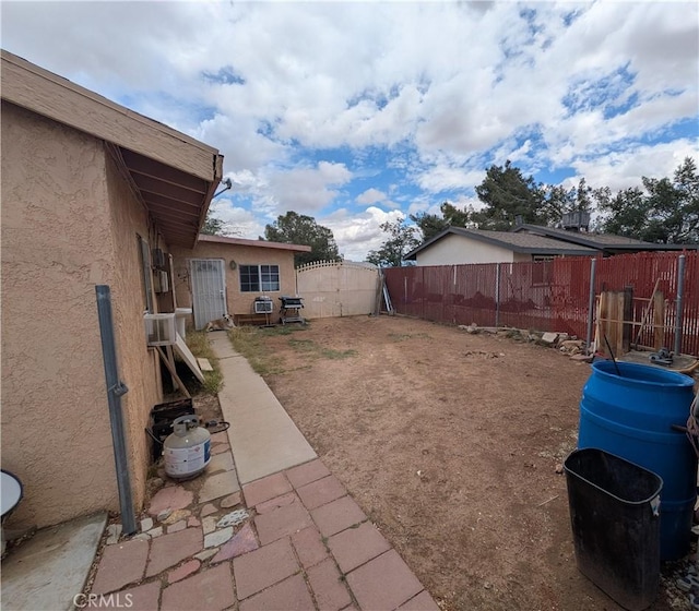 14136 Osage Rd, Apple Valley, CA 92307 - view of yard featuring a fenced backyard
