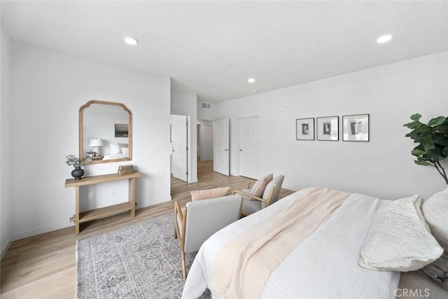 2475 Victoria Ave Unit 410, San Luis Obispo, CA 93401 - bedroom with light wood-style flooring, visible vents, and recessed lighting
