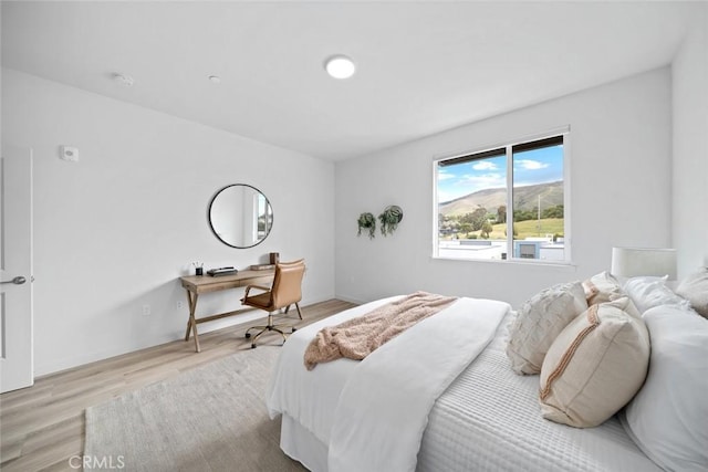 2475 Victoria Ave Unit 410, San Luis Obispo, CA 93401 - bedroom featuring light wood-style floors