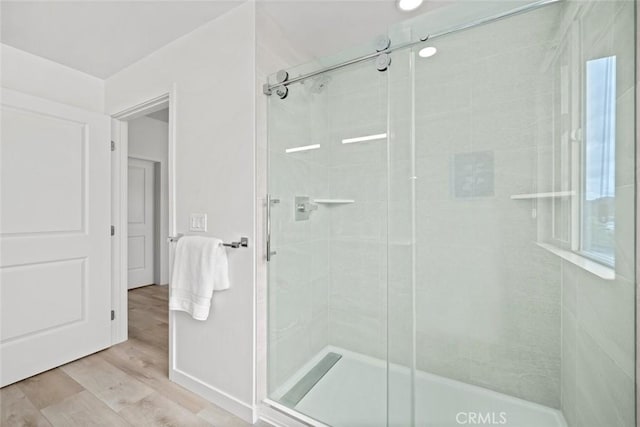 2475 Victoria Ave Unit 410, San Luis Obispo, CA 93401 - bathroom with wood finished floors and a shower stall