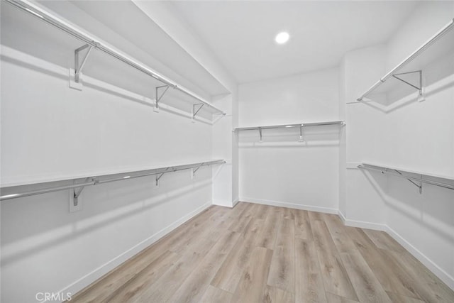 2475 Victoria Ave Unit 410, San Luis Obispo, CA 93401 - walk in closet with wood finished floors
